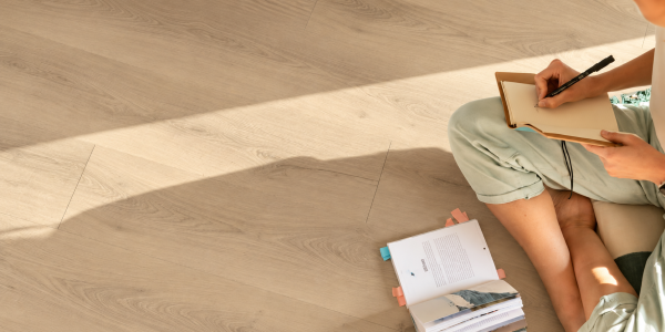 fumane-floor-008-sunlit-journaling-on-oak-floors LOC Floor Extra Laminate Flooring
